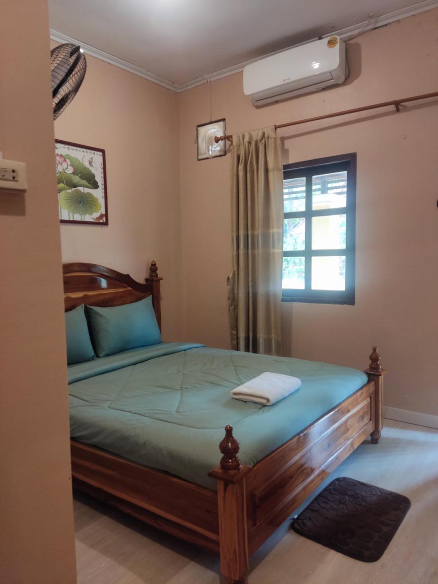 Erawan Guesthouse Pakse Exterior foto