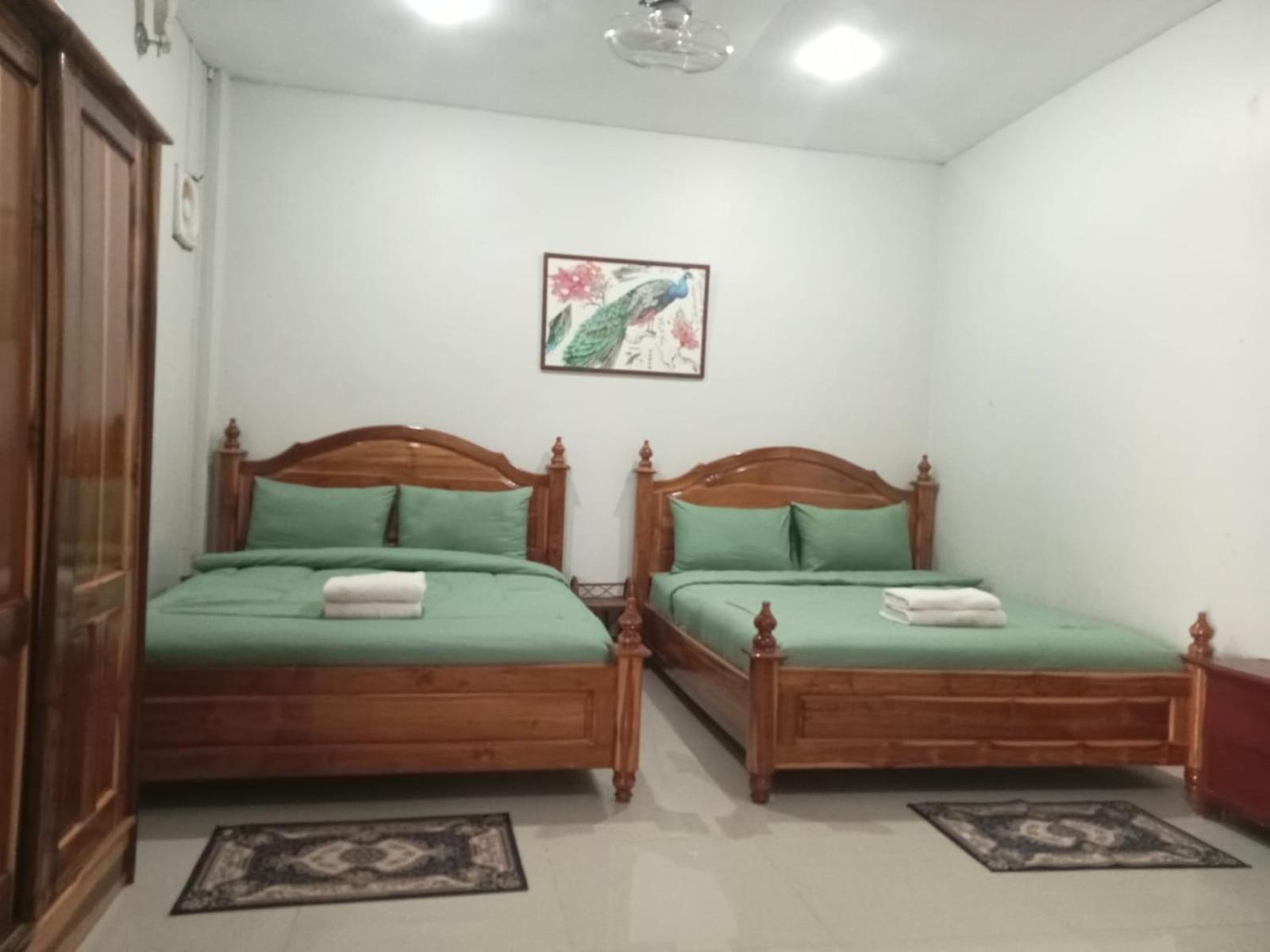 Erawan Guesthouse Pakse Exterior foto